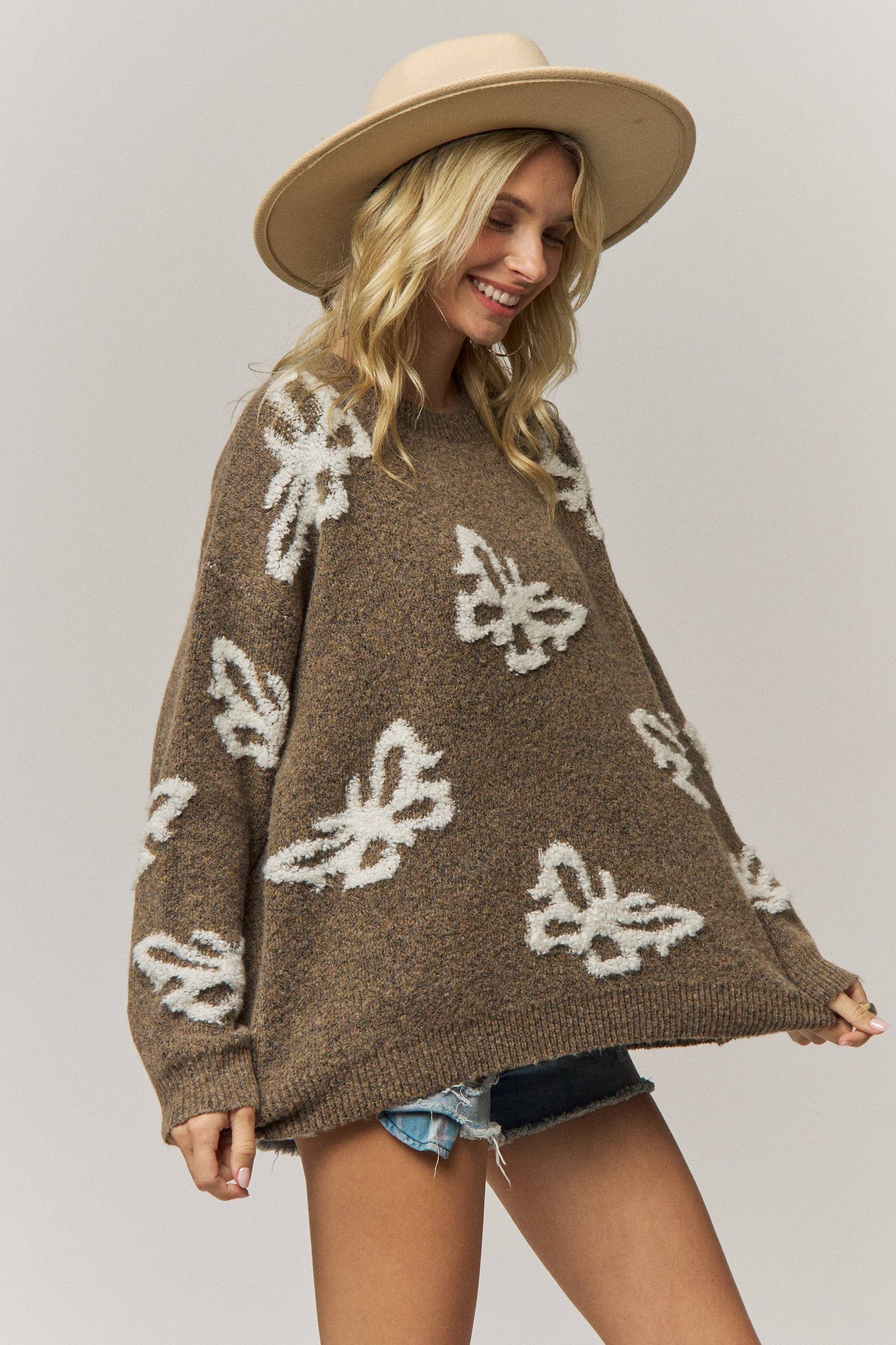 COZY BUTTERFLY PATTERNED KNIT SWEATER